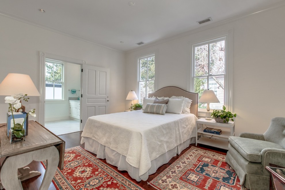Inspiration for a mid-sized traditional master bedroom in DC Metro with white walls and dark hardwood floors.