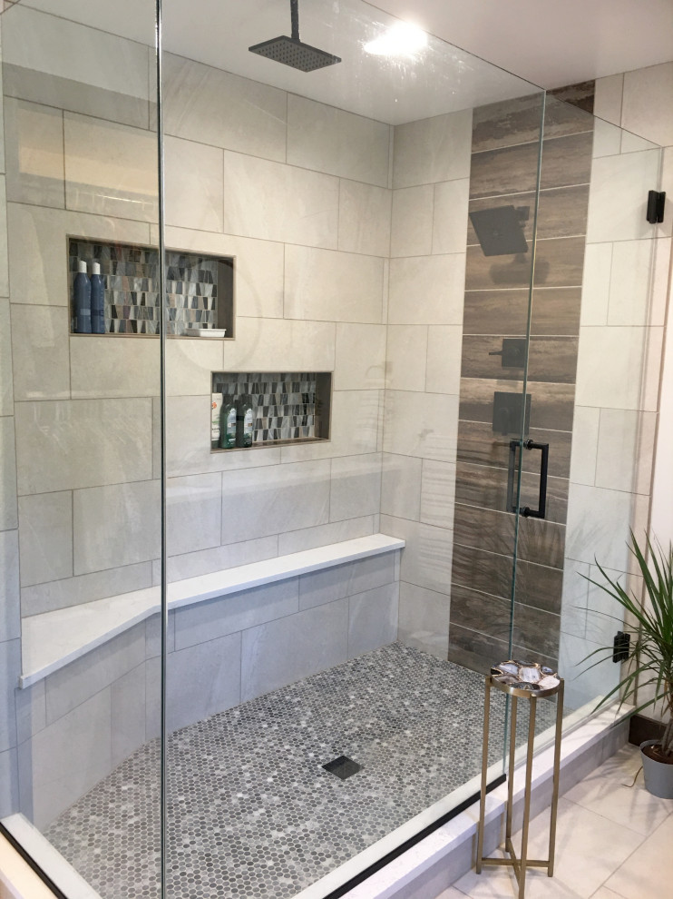 Mid-sized transitional master bathroom in Denver with recessed-panel cabinets, dark wood cabinets, a curbless shower, an undermount sink, engineered quartz benchtops, a hinged shower door and white benchtops.