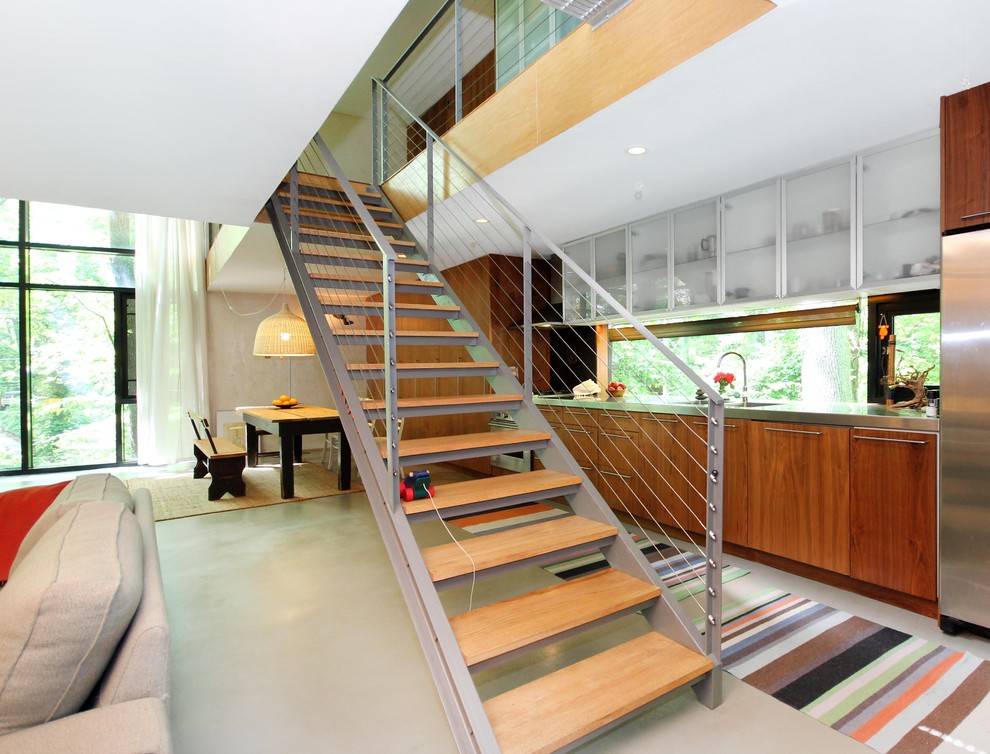 Inspiration for a contemporary staircase in Other with cable railing.