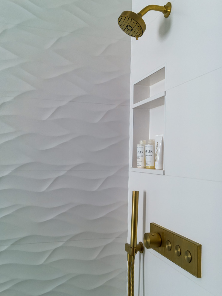 Inspiration for a transitional master white tile and ceramic tile porcelain tile, gray floor and double-sink freestanding bathtub remodel in Chicago with shaker cabinets, white cabinets, a two-piece toilet, gray walls, an undermount sink, quartz countertops, a hinged shower door, white countertops, a niche and a built-in vanity