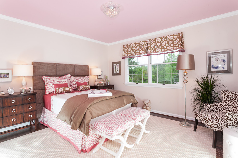 Traditional kids' room in Baltimore with pink walls, carpet and beige floor for girls.