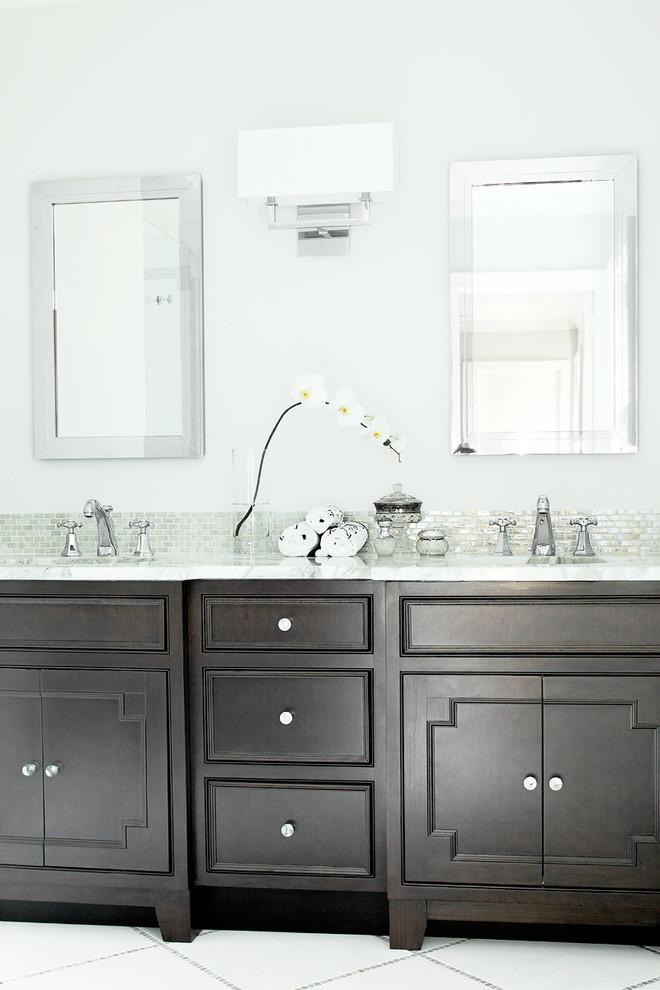 Design ideas for a mid-sized transitional master bathroom in New York with raised-panel cabinets, dark wood cabinets, an open shower, a one-piece toilet, gray tile, matchstick tile, white walls, ceramic floors, a drop-in sink and solid surface benchtops.