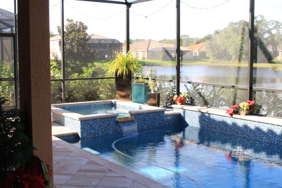 Inspiration for a transitional pool remodel in Tampa