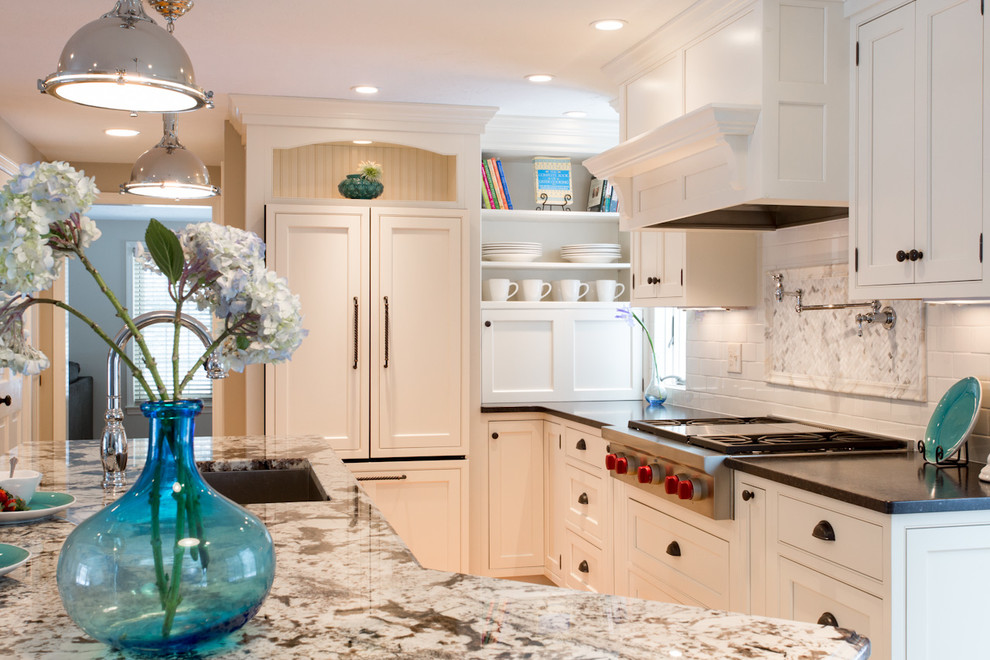 Inspiration for a mid-sized traditional kitchen in Boston with granite benchtops, a single-bowl sink, shaker cabinets, white cabinets, white splashback, subway tile splashback, stainless steel appliances, medium hardwood floors, with island and beige floor.