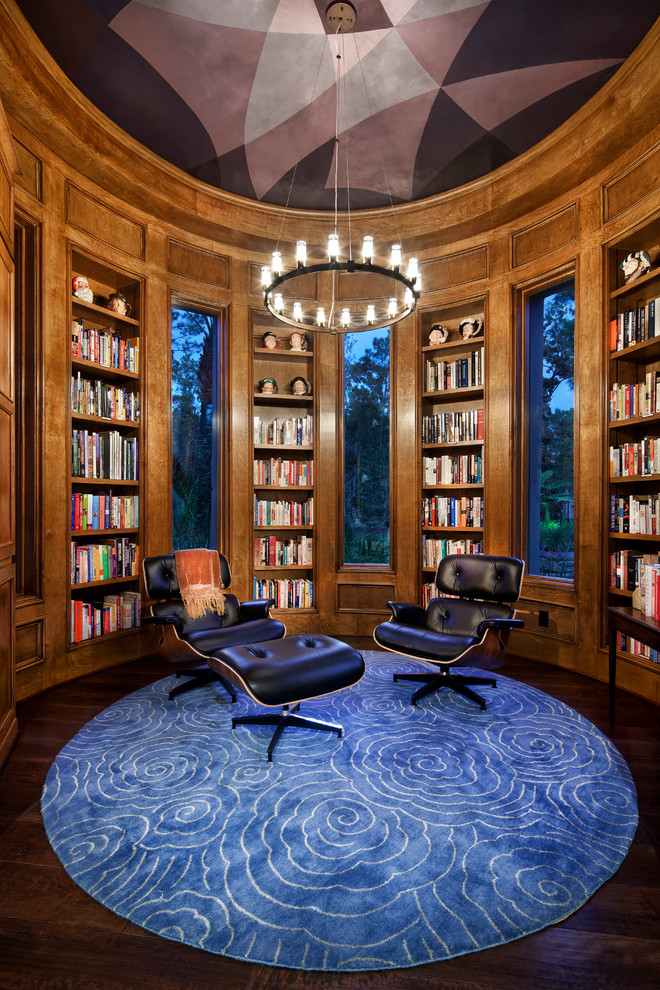 Photo of a contemporary enclosed family room in Houston with a library and dark hardwood floors.