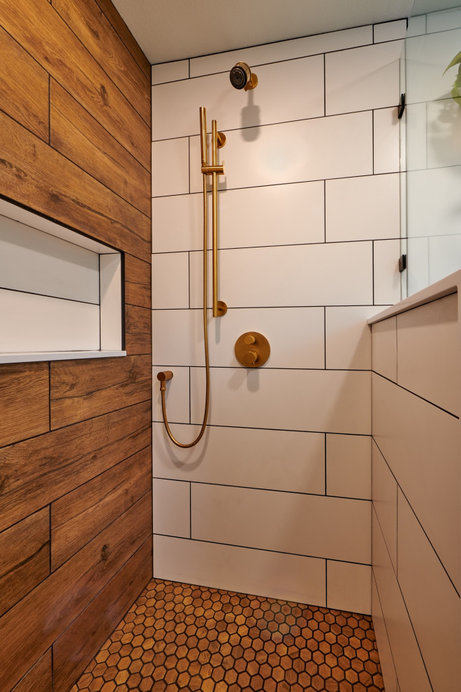 This is an example of a small scandinavian master wet room bathroom in Seattle with furniture-like cabinets, medium wood cabinets, a bidet, multi-coloured tile, ceramic tile, white walls, porcelain floors, an undermount sink, engineered quartz benchtops, black floor, a hinged shower door, white benchtops, a single vanity and a freestanding vanity.