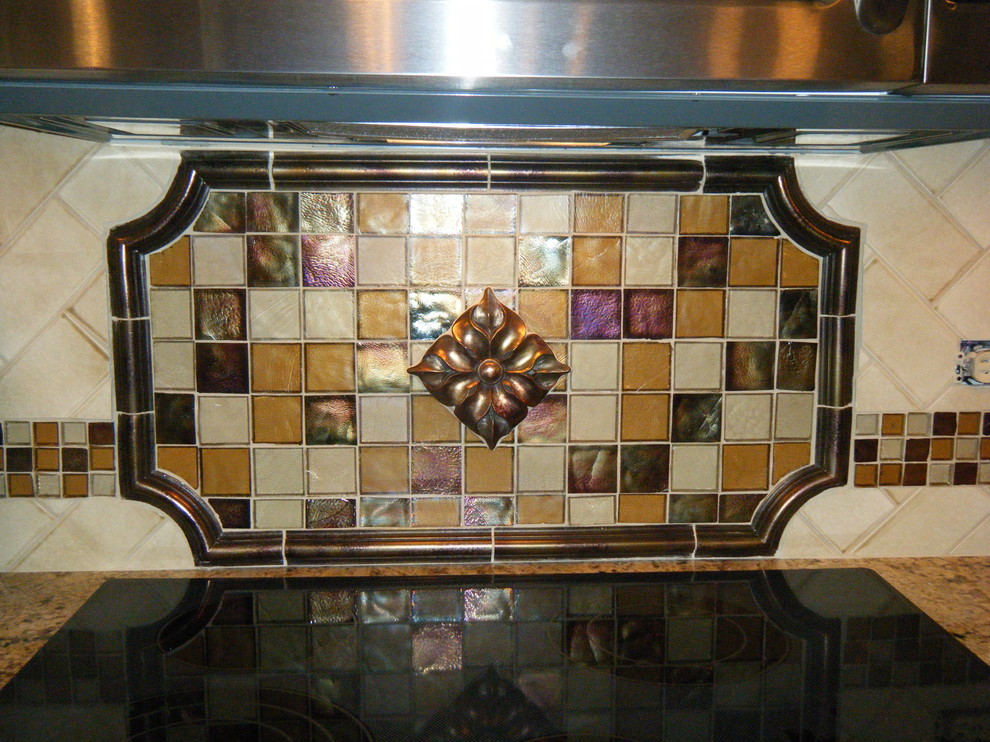 Large transitional u-shaped eat-in kitchen photo in Chicago with dark wood cabinets, granite countertops, beige backsplash, ceramic backsplash and an island