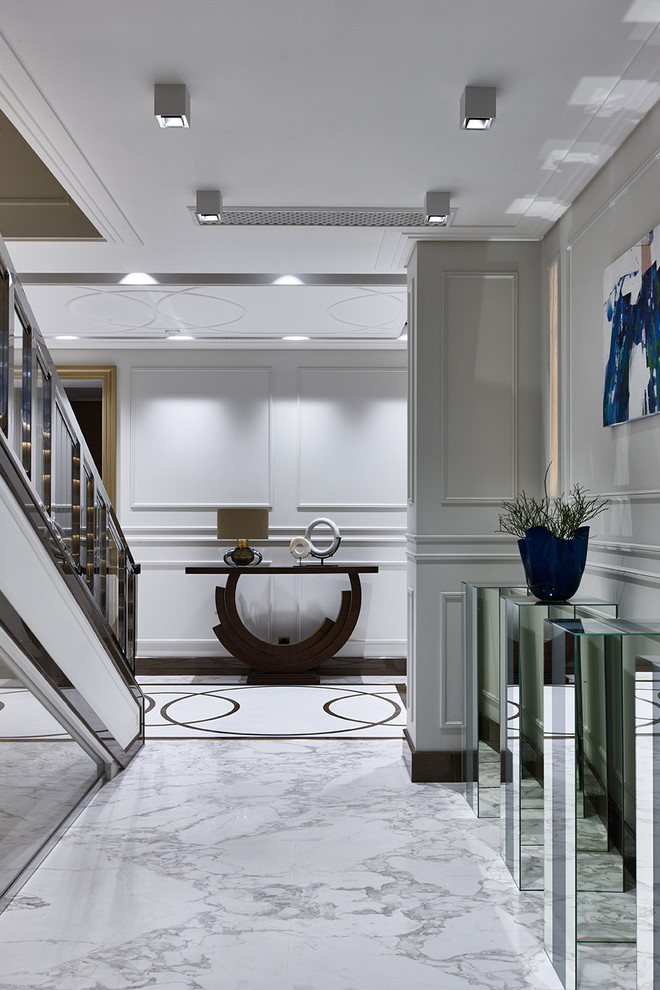 Inspiration for a contemporary hallway in Moscow with grey walls and grey floor.