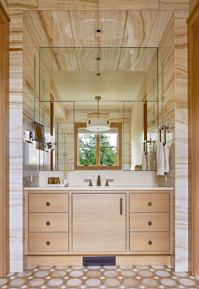 Transitional master bathroom in Seattle with flat-panel cabinets, light wood cabinets, marble, mosaic tile floors, an undermount sink, white benchtops, an enclosed toilet, a single vanity, a built-in vanity, beige tile and beige floor.