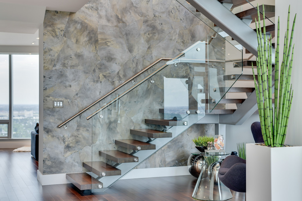 Photo of an expansive contemporary staircase in Calgary.