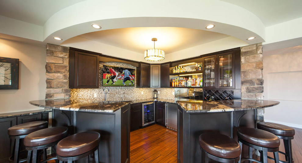 Example of a transitional home design design in Denver