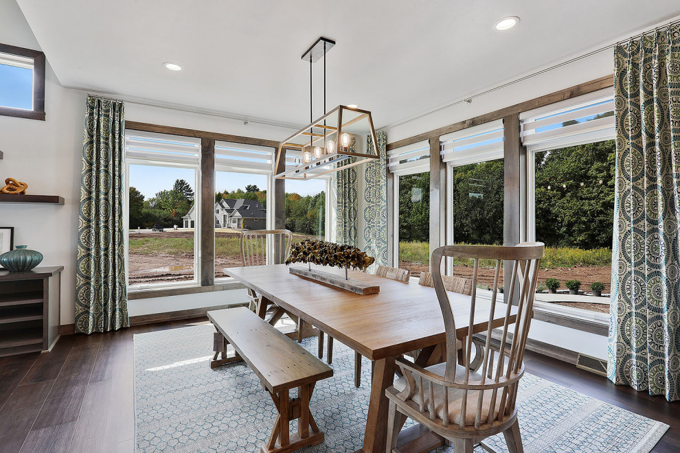 Kitchen/dining room combo - mid-sized transitional dark wood floor and brown floor kitchen/dining room combo idea with white walls and no fireplace