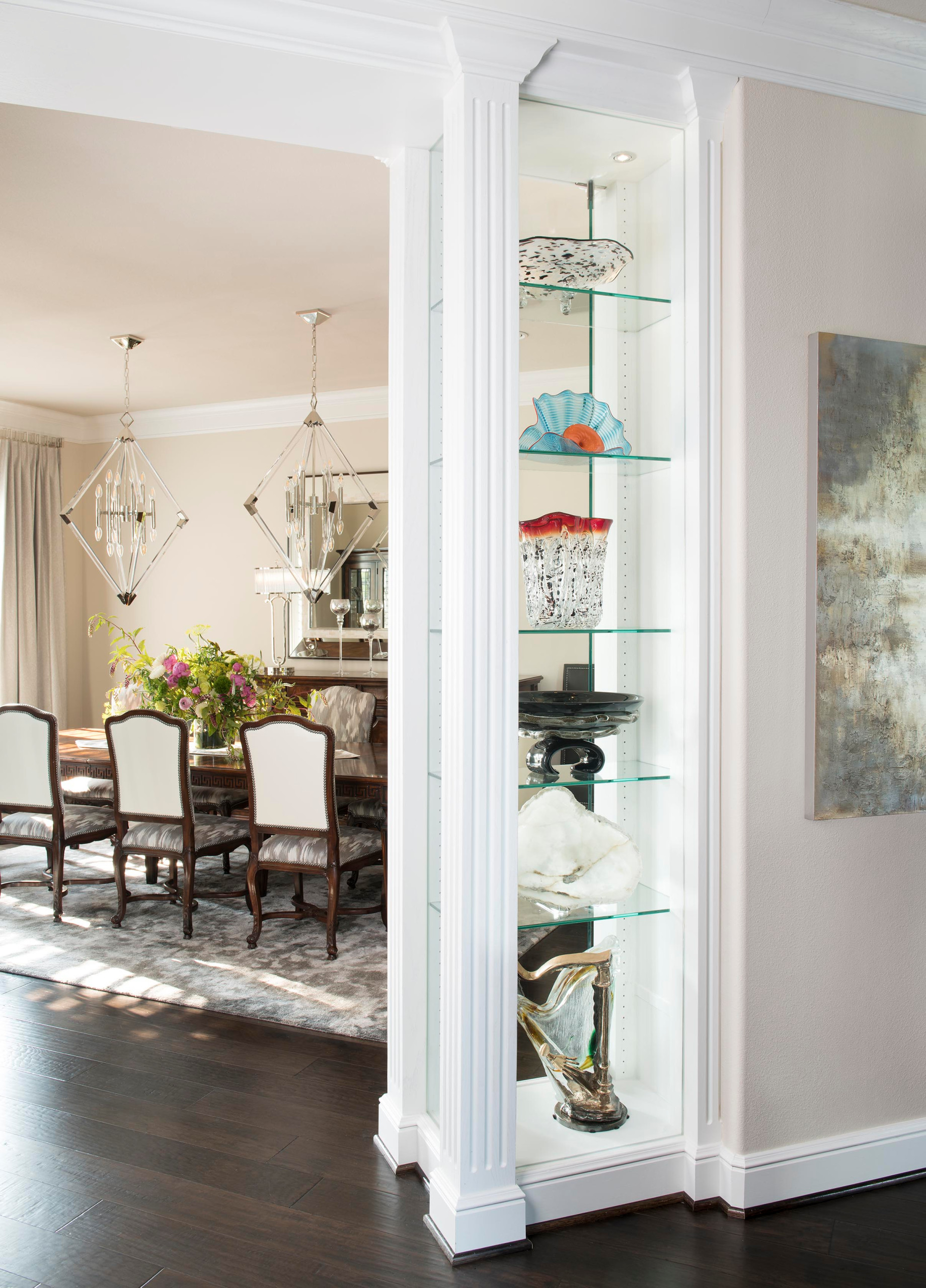 Modern Mediterranean Dining Room with Display Shelves