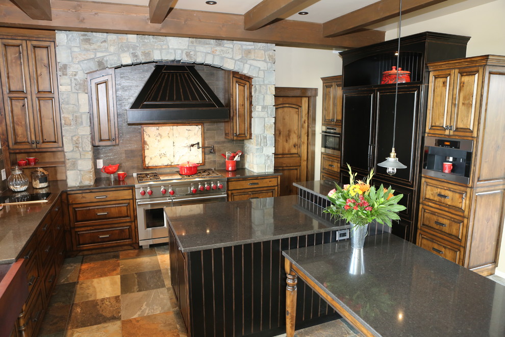 Inspiration for a rustic u-shaped porcelain tile eat-in kitchen remodel with a farmhouse sink, recessed-panel cabinets, dark wood cabinets, quartz countertops, brown backsplash, porcelain backsplash, paneled appliances and an island
