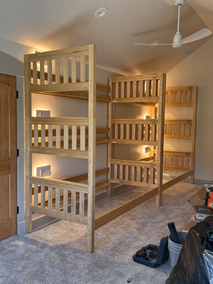 Upper level loft bunk room, phone chargers with lights, ceiling fans,