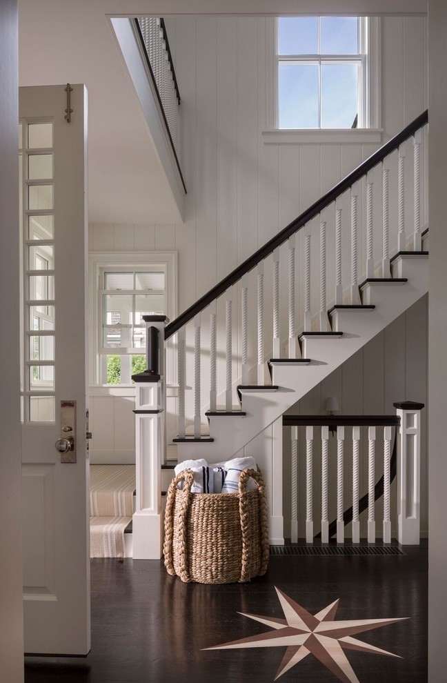 Inspiration for a mid-sized beach style wood l-shaped staircase in Boston with wood risers.