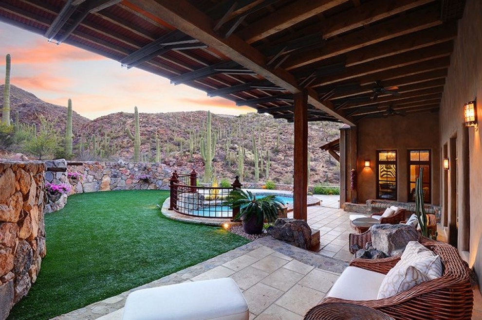 Inspiration for a rustic pool remodel in Phoenix