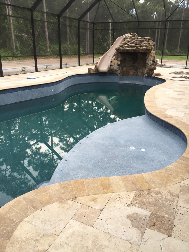 Mountain style pool photo in New York