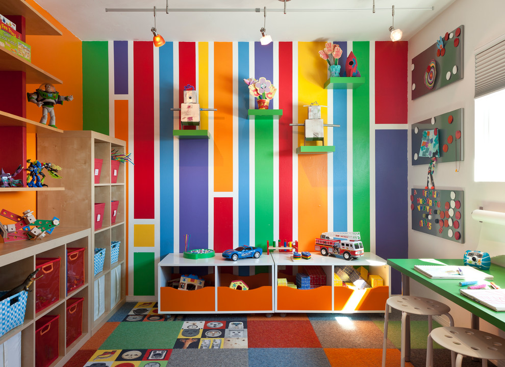 Midcentury gender-neutral kids' room in Other with carpet.