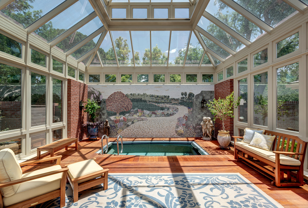 Design ideas for a large traditional sunroom in Austin with medium hardwood floors, no fireplace and a glass ceiling.