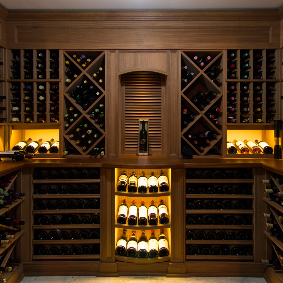 Inspiration for a mid-sized contemporary wine cellar in Montreal with ceramic floors and diamond bins.
