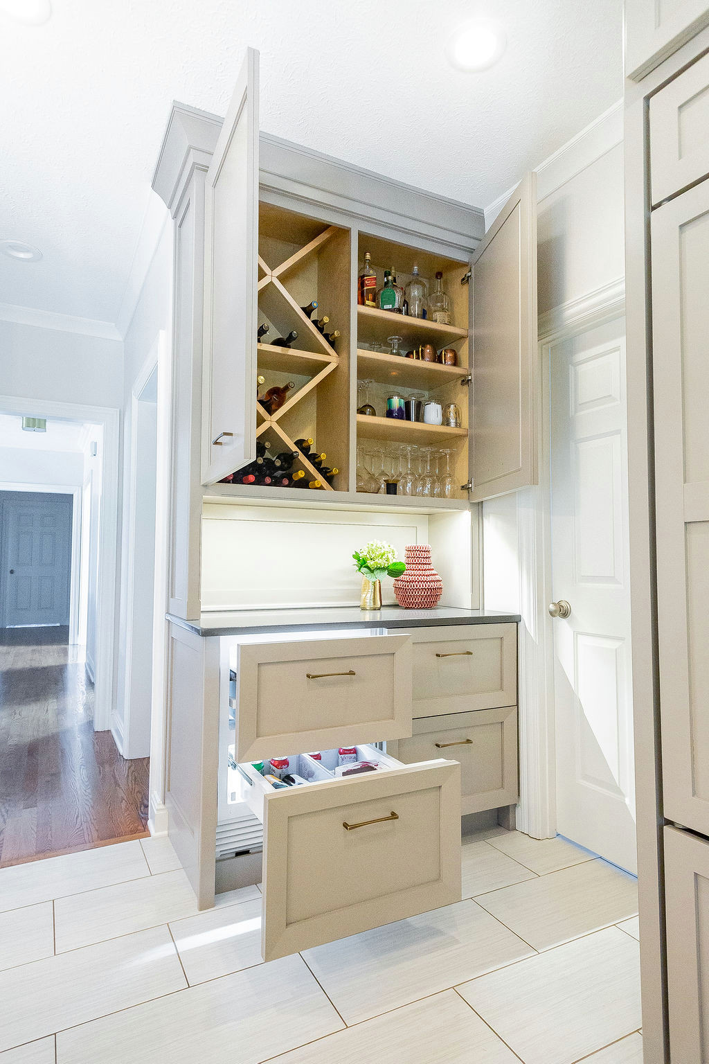 Custom dry bar with refrigerator drawers