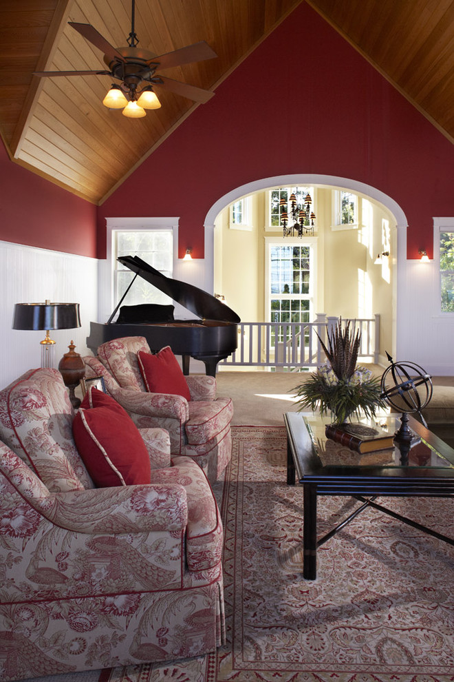 Photo of a traditional living room in Minneapolis with red walls.