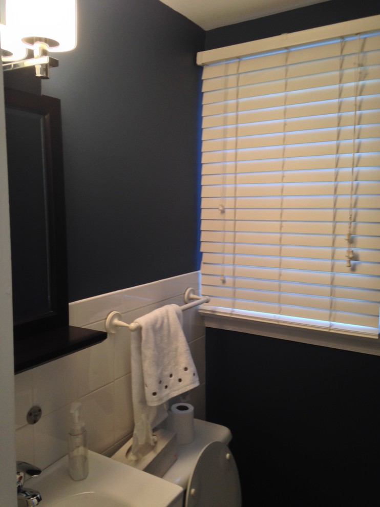 Small transitional bathroom in Other with white tile, ceramic tile and blue walls.