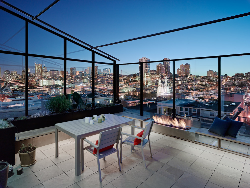 Photo of a contemporary rooftop and rooftop deck in San Francisco with a fire feature.
