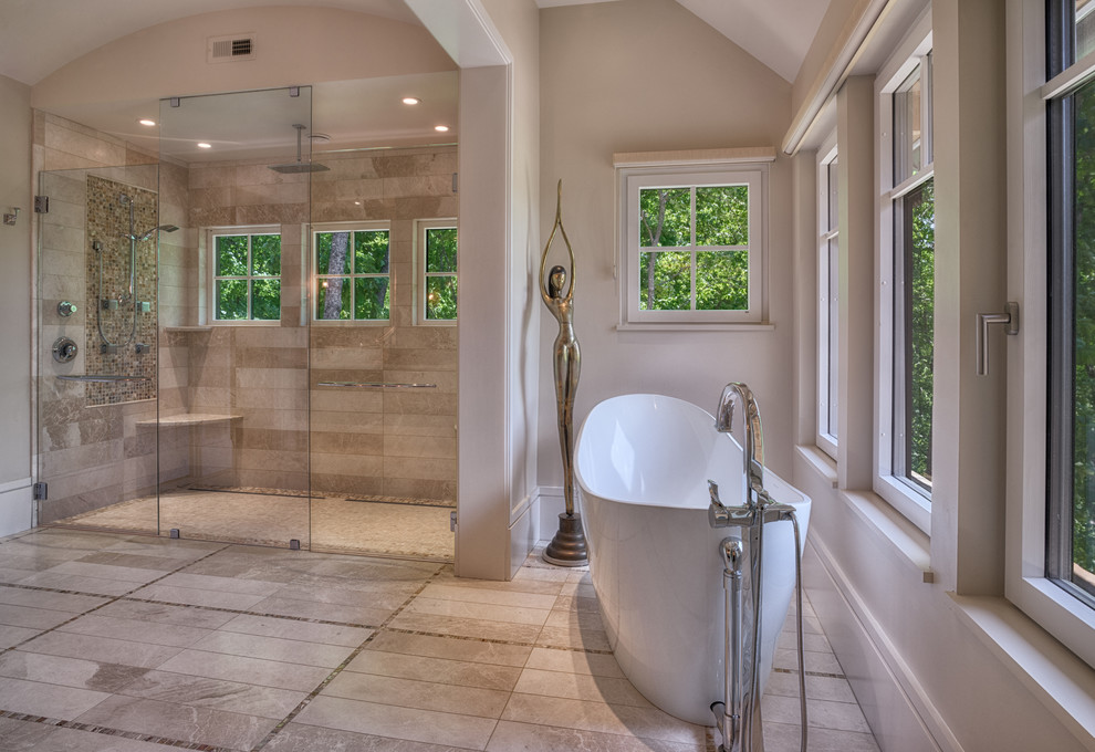This is an example of a large eclectic master bathroom in Other with flat-panel cabinets, medium wood cabinets, a freestanding tub, a curbless shower, an urinal, stone slab, beige walls, porcelain floors, a vessel sink, granite benchtops and beige tile.