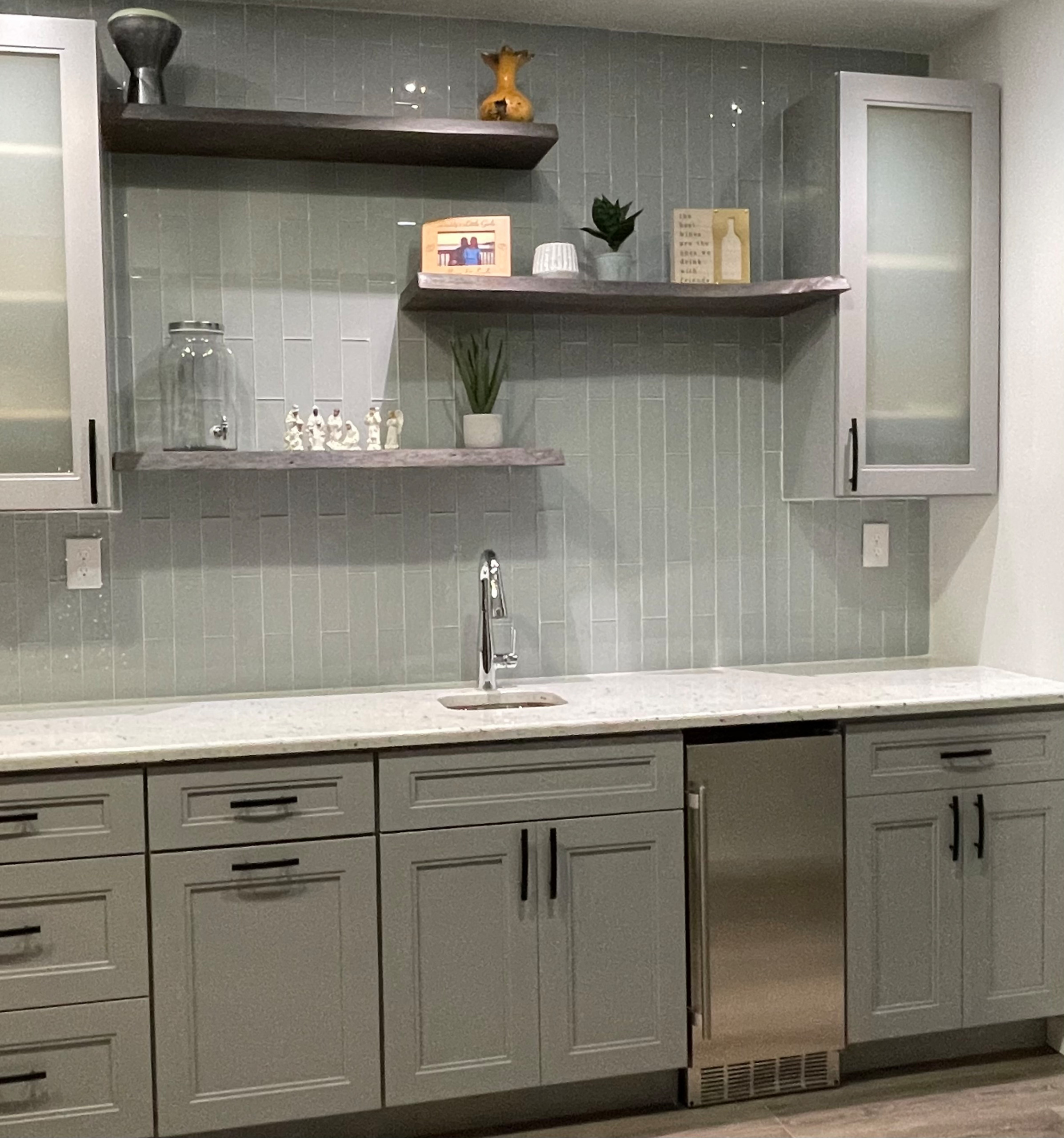 Custom service bar intended for entertainment and ease of use in client's basement!