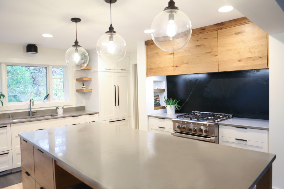 Inspiration for a mid-sized scandinavian l-shaped kitchen in Minneapolis with quartzite benchtops, stone slab splashback, with island and grey benchtop.