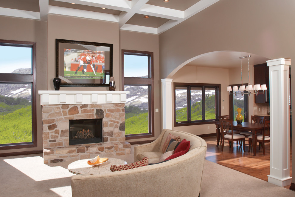 Photo of a mid-sized transitional formal open concept living room in Other with beige walls, carpet, a standard fireplace, a stone fireplace surround, a built-in media wall and beige floor.