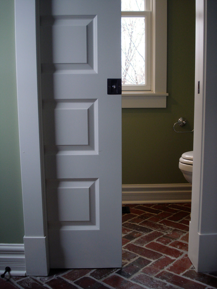 This is an example of a traditional powder room in Indianapolis.