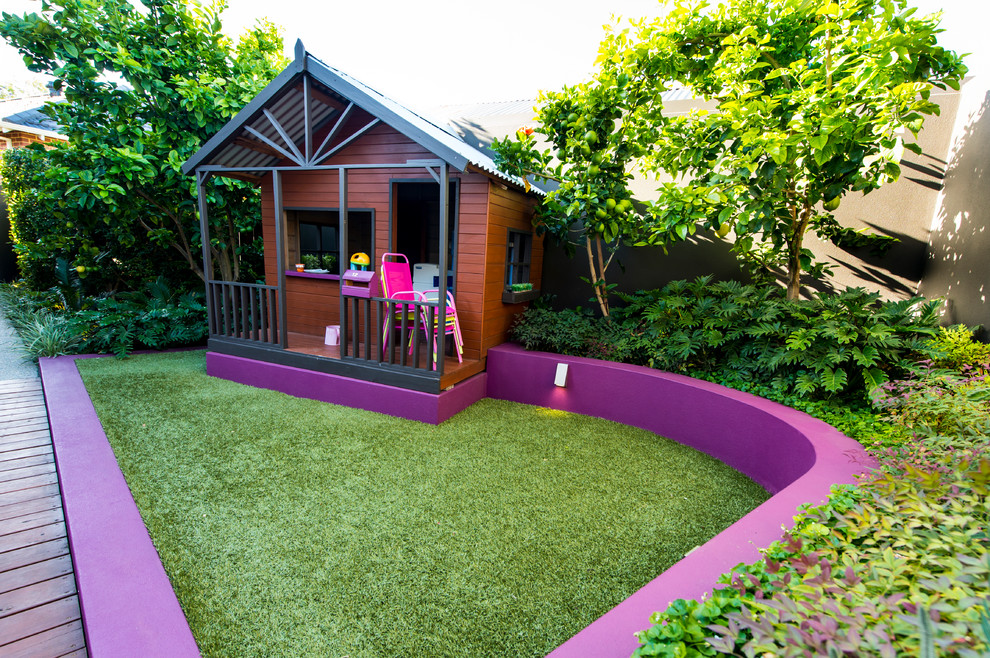 Design ideas for a small contemporary garden in Perth with with outdoor playset.