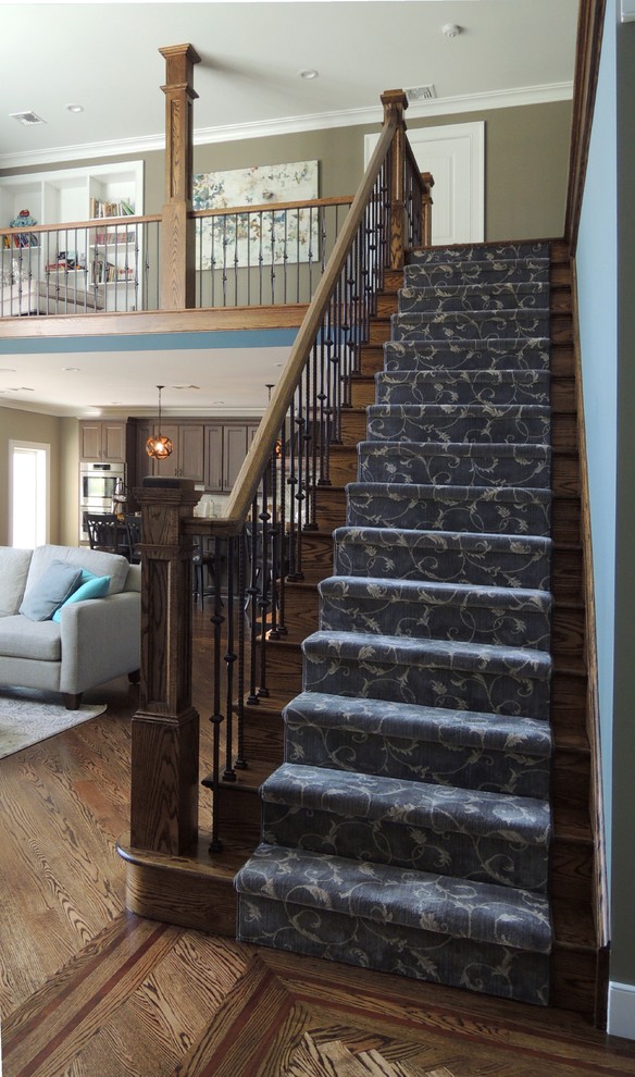 Design ideas for a large arts and crafts wood straight staircase in New York with mixed railing and wood risers.