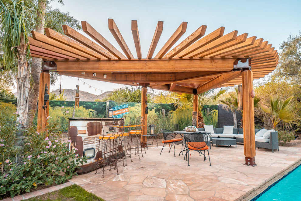 Example of a mountain style patio design in Phoenix