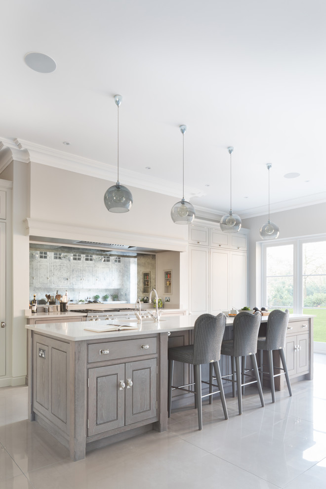 This is an example of a large transitional kitchen in Essex.