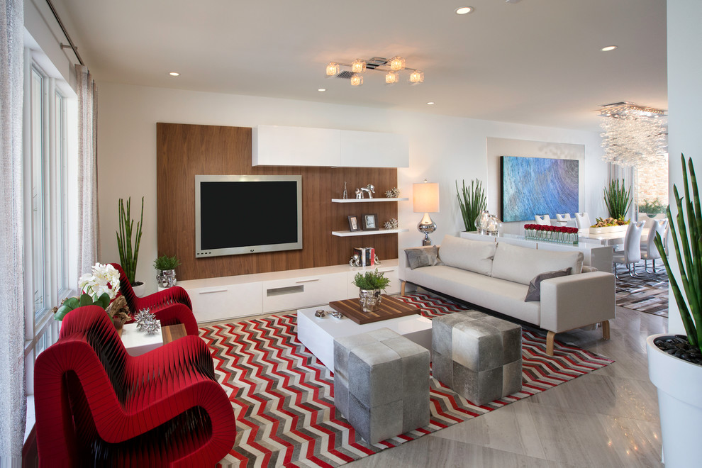 Photo of a large contemporary open concept living room in Miami with white walls, marble floors and a wall-mounted tv.