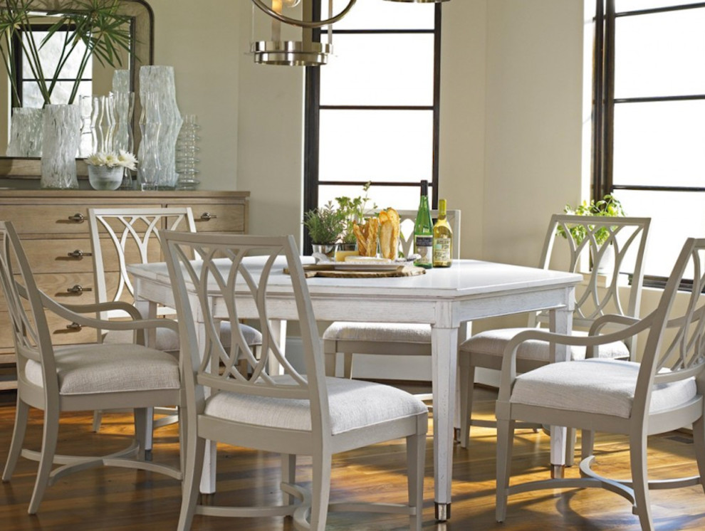Large medium tone wood floor great room photo with beige walls