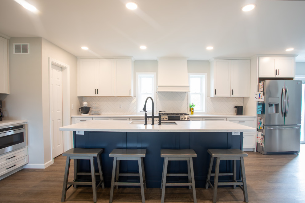 Inspiration for a transitional vinyl floor kitchen/dining room combo remodel