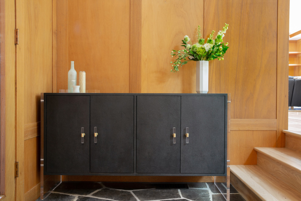 Inspiration for a midcentury entryway in San Francisco with brown walls, slate floors, a double front door, a blue front door, black floor, vaulted and panelled walls.