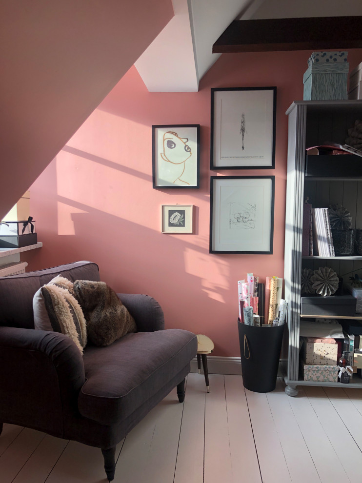 Design ideas for a small country home office in Munich with pink walls, light hardwood floors and white floor.