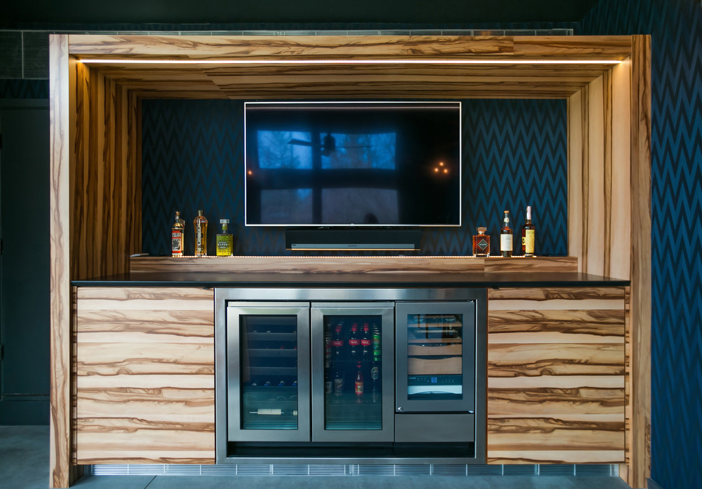 Example of a small 1960s concrete floor and gray floor home bar design in Indianapolis