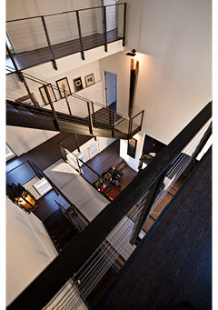 This is an example of a modern metal staircase in Raleigh with metal risers.