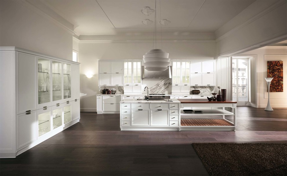 Inspiration for a transitional l-shaped open concept kitchen remodel with flat-panel cabinets and an island