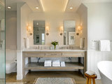 Farmhouse Bathroom by Patterson and Smith Construction, Inc.