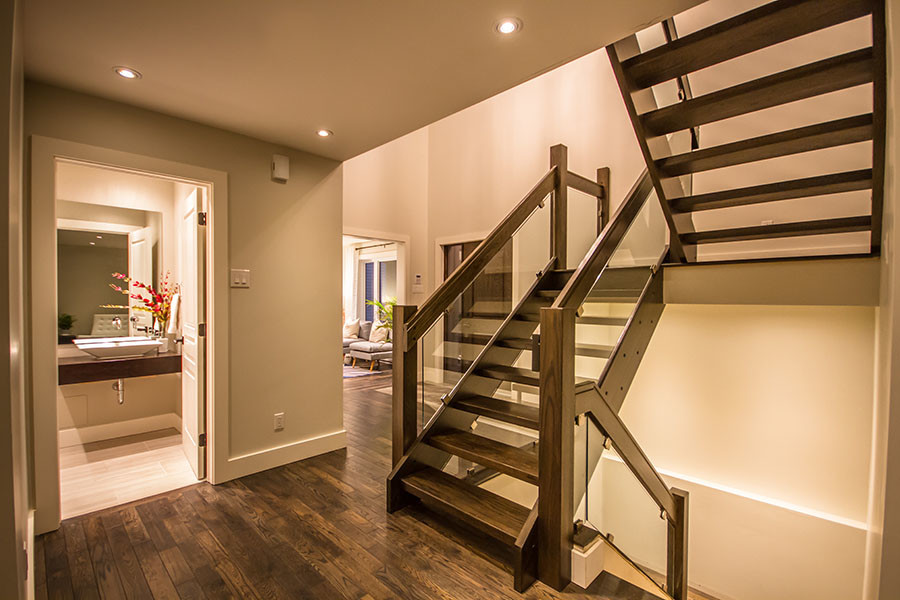 Staircase - transitional wooden u-shaped open staircase idea