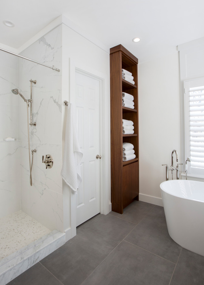 Inspiration for a mid-sized contemporary master brown tile and subway tile gray floor and single-sink bathroom remodel in New York with flat-panel cabinets, medium tone wood cabinets, white walls, an undermount sink, white countertops and a built-in vanity