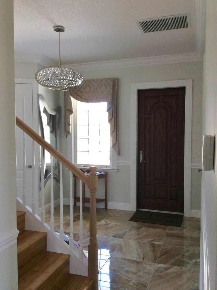 Transitional entryway photo in Miami